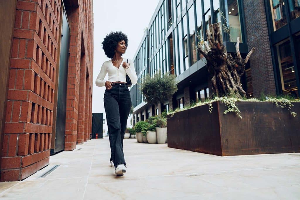 a woman walks to her intensive outpatient alcohol treatment in denver colorado