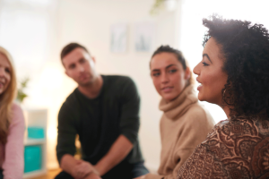 a group of people participate in alcohol addiction treatment center in loveland co