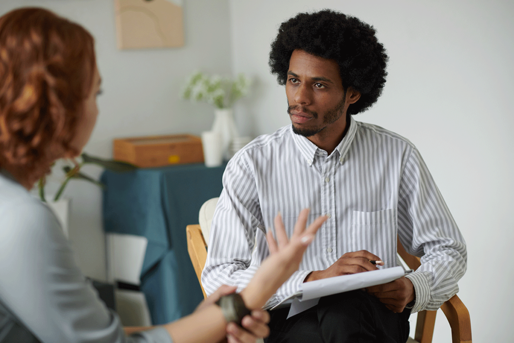 a person talks to a therapist about where to get ptsd treatment in loveland co